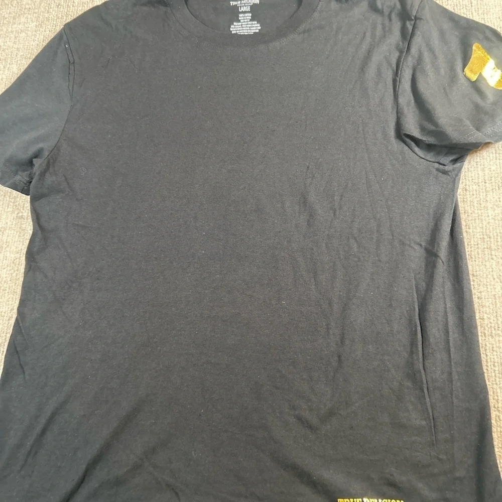 True Religion Black Tee with Gold Accents